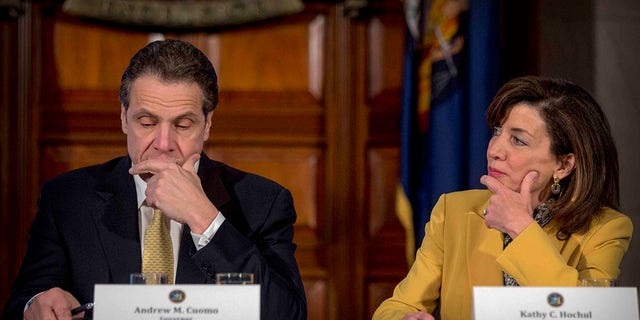 FILE - This photo from Wednesday, Feb. 25, 2015, shows New York Gov. Andrew Cuomo, left, and Lt. Gov. Kathy Hochul during a cabinet meeting at the Capitol in Albany, N.Y. (AP Photo/Mike Groll, File)