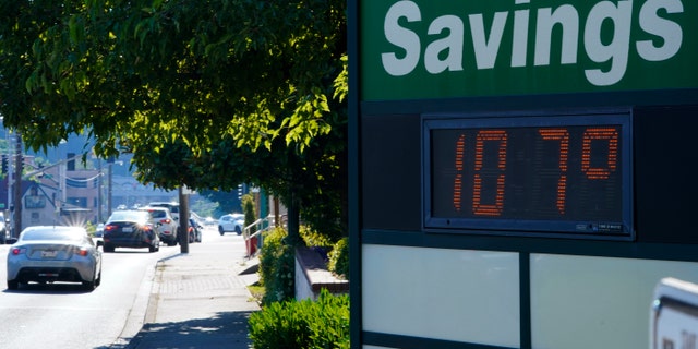 In this June 28, 2021 file photo a display at an Olympia Federal Savings branch shows a temperature of 107 degrees Fahrenheit, in the early evening in Olympia, Wash. The Pacific Northwest is bracing for another major, multi-day heat wave in mid-August 2021 just a month after temperatures soared as high as 116 F in a record-shattering heat event that killed scores of the most vulnerable across the region.