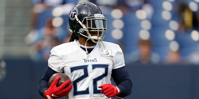 Tennessee Titans running back Derrick Henry runs a drill during NFL football training camp Monday, Aug. 16, 2021, in Nashville, Tenn. (AP Photo/Mark Humphrey)