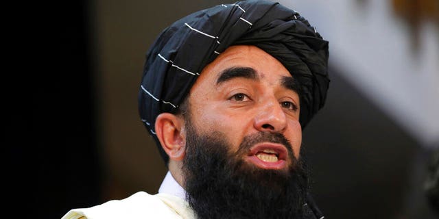 Taliban spokesman Zabihullah Mujahid speaks at at his first news conference, in Kabul, Afghanistan, Tuesday, Aug. 17, 2021. Mujahid vowed Tuesday that the Taliban would respect women's rights, forgive those who resisted them and ensure a secure Afghanistan as part of a publicity blitz aimed at convincing world powers and a fearful population that they have changed. (AP Photo/Rahmat Gul)