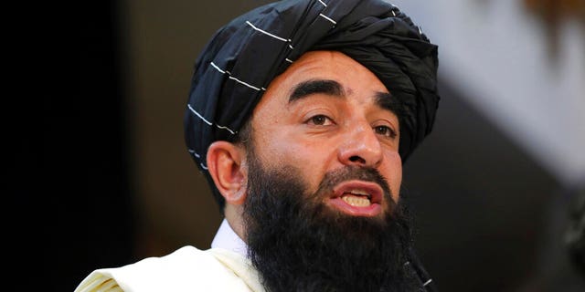 Taliban spokesman Zabihullah Mujahid speaks at at his first news conference, in Kabul, Afghanistan, Tuesday, Aug. 17, 2021. Mujahid vowed Tuesday that the Taliban would respect women's rights, forgive those who resisted them and ensure a secure Afghanistan as part of a publicity blitz aimed at convincing world powers and a fearful population that they have changed. (AP Photo/Rahmat Gul)