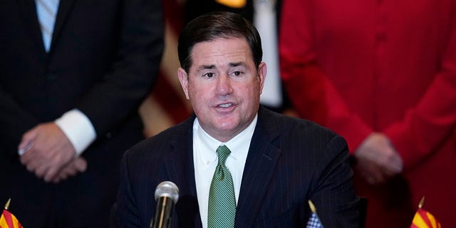 Arizona Republican Gov. Doug Ducey speaks during a bill signing in Phoenix. 