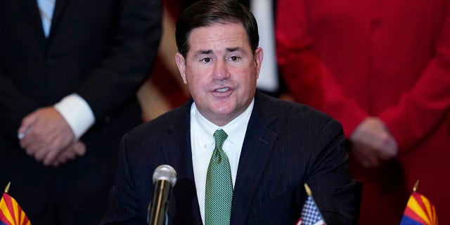 Arizona Republican Gov. Doug Ducey speaks during a bill signing in Phoenix. 