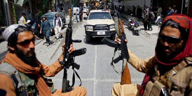Taliban fighters patrol Kabul, Afghanistan, Thursday, Aug. 19, 2021. The Taliban celebrated Afghanistan's Independence Day on Thursday by declaring they beat the United States, but challenges to their rule ranging from running a country severely short on cash and bureaucrats to potentially facing an armed opposition began to emerge. (AP Photo/Rahmat Gul)