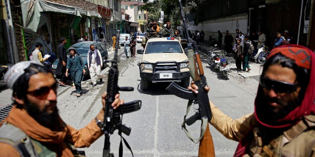 Taliban fighters patrol Kabul, Afghanistan, Thursday, Aug. 19, 2021. The Taliban celebrated Afghanistan's Independence Day on Thursday by declaring they beat the United States, but challenges to their rule ranging from running a country severely short on cash and bureaucrats to potentially facing an armed opposition began to emerge. (AP Photo/Rahmat Gul)