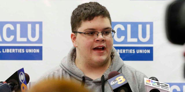 In this March 6, 2017, file photo, Gloucester County High School senior Gavin Grimm, a transgender student, speaks during a news conference in Richmond, Virginia. The Gloucester County School Board has agreed to pay $1.3 million in legal costs to the American Civil Liberties Union after the nonprofit spent six years representing a student who sued over the board's transgender bathroom ban. 