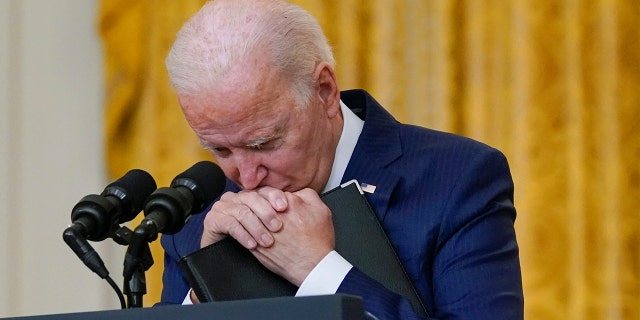 President Joe Biden pauses as he listens to a question about the bombings at the Kabul airport that killed at least 12 U.S. service members, from the East Room of the White House, Thursday, Aug. 26, 2021, in Washington. (Associated Press)