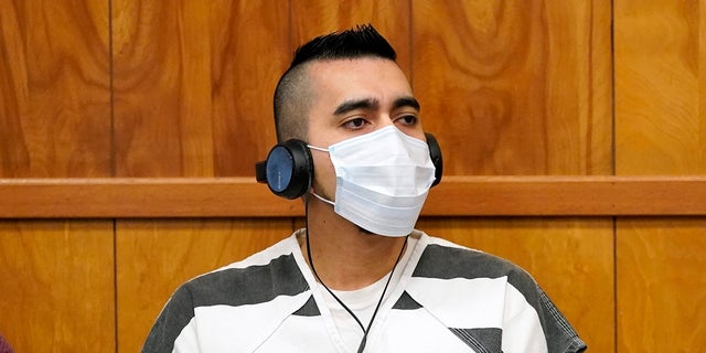 Cristhian Bahena Rivera listens to proceedings during his sentencing Monday at the Poweshiek County Courthouse in Montezuma, Iowa. He was sentenced to life in prison for the stabbing death of college student Mollie Tibbetts. (AP Photo/Charlie Neibergall, pool)