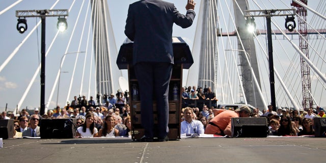 In this Aug. 24, 2017 photo, New York Gov. Andrew Cuomo speaks at a ribbon-cutting ceremony for the new Gov. Mario M. Cuomo Bridge, replacing the Tappan Zee Bridge, in Tarrytown, N.Y.  