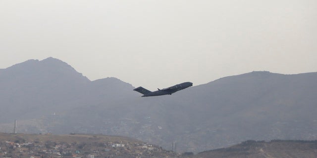 A US military plane takes off from Hamid Karzai International Airport in Kabul, Afghanistan.