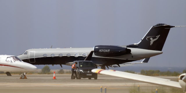 Alex Rodriguez arrived in Ibiza on his private jet with his corporate logo.