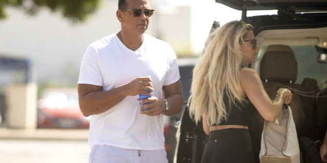 Alex Rodriguez and Melanie Collins arrive in Ibiza.
