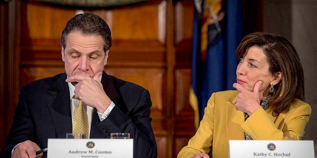 FILE - This photo from Wednesday, Feb. 25, 2015, shows New York Gov. Andrew Cuomo, left, and Lt. Gov. Kathy Hochul during a cabinet meeting at the Capitol in Albany, N.Y. 