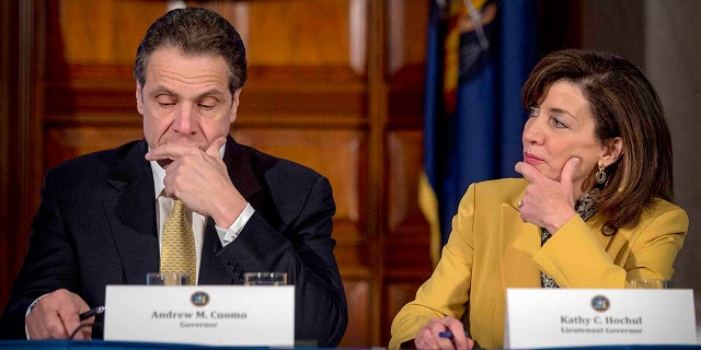 FILE - This photo from Wednesday, Feb. 25, 2015, shows New York Gov. Andrew Cuomo, left, and Lt. Gov. Kathy Hochul during a cabinet meeting at the Capitol in Albany, N.Y.