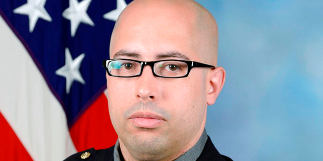 This undated photo provided by the Pentagon Force Protection Agency shows Pentagon Police Officer George Gonzalez.