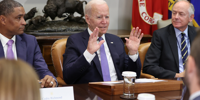 President Biden, flanked by Environmental Protection Agency (EPA) Administrator Michael Regan and senior aide Steve Ricchetti, holds a meeting on infrastructure with labor and business leaders at the White House in Washington, D.C., July 22, 2021. 