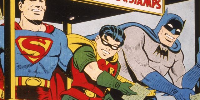 Cover illustration for 'World's Finest Comics,' with Superman, Batman and Robin selling US War Bonds to sink the 'Japanazis' in World War II, 1940s.