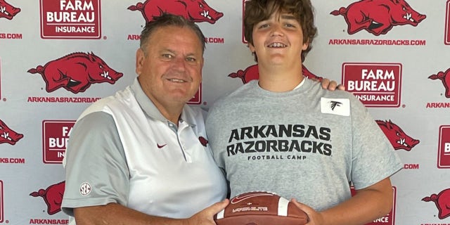 Bear McWhorter, 13, (reg) recently put up a billboard to get the attention of University of Arkansas’ Razorbacks’ football head coach Sam Pittman (links).