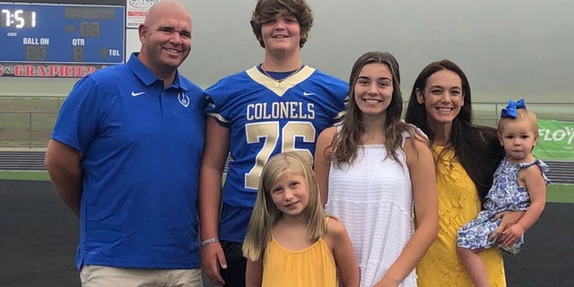 McWhorter, pictured with his family, has been a devoted tackle football player since around six.