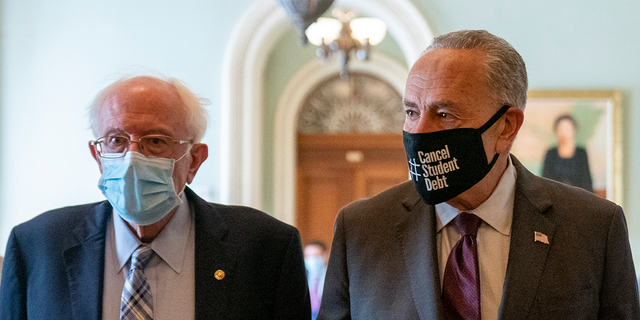 Sen.  Bernie Sanders, I-Vt., Left, and Senate Majority Leader Chuck Schumer of NY, right, walk out of a budget resolution meeting at the Capitol in Washington on Monday, August 9, 2021. Schumer said Wednesday that he is confident is spending and inflation concerns by moderate senators will not jeopardize the reconciliation package led by Sanders.  (AP Photo / Andrew Harnik)
