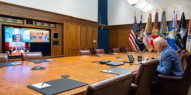 President Biden speaks with Vice President Kamala Harris and members of his national security team from Camp David in Maryland, Aug. 14, 2021. (White House)