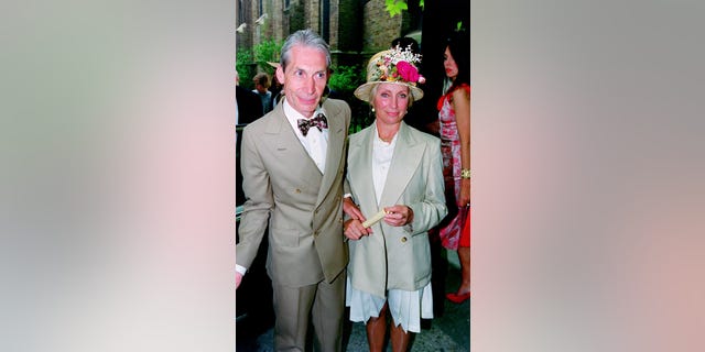 Drummer of The Rolling Stones, Charlie Watts and his wife Shirley Ann Shepherd, attend Georgia May Jagger's christening at Saint Andrew's church, Richmond in 1992. Watts died on August 24 in London surrounded by his family.