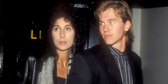 Cher and Val Kilmer attend Bette Midler's video party in 1984.