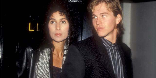 Cher and Val Kilmer attend Bette Midler's video party in 1984.