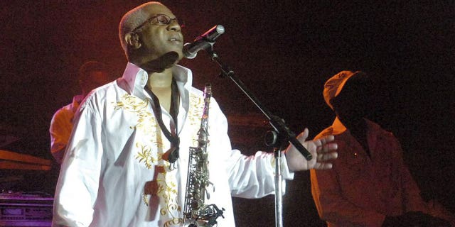 In this August 3, 2008 file photo, Dennis Thomas performs with the band "Kool and the gang" in concert in Bethlehem, Pennsylvania Dennis "Dee T-shirt" Thomas, a founding member of longtime soul-funk group Kool & the Gang, is dead.  Thomas passed away peacefully in his sleep on Saturday August 7, 2021 in New Jersey, where he resided in Montclair.