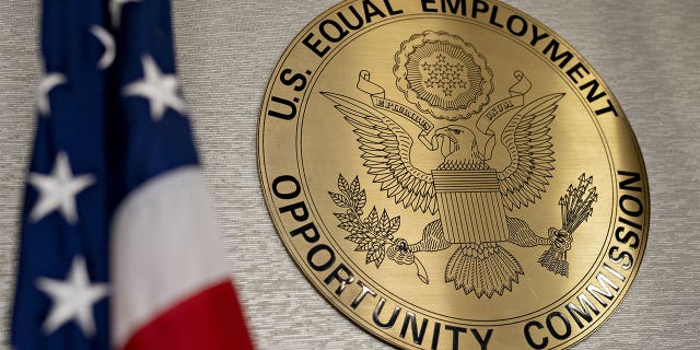 The Equal Employment Opportunity Commission seal inside a hearing room at headquarters in Washington, D.C.