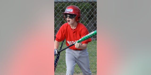 Erik Robinson is pictured playing baseball in 2009.