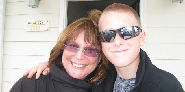 Judy Rogg and her late son Erik Robinson, 12, are pictured in March 2010. 