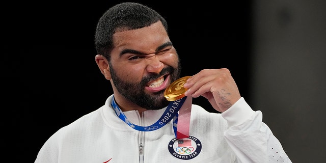 United States' Gable Steveson celebrates with his gold medal during the victory ceremony for men's freestyle 125kg wrestling at the 2020 Summer Olympics, Friday, Aug. 6, 2021, in Chiba, Japan. 