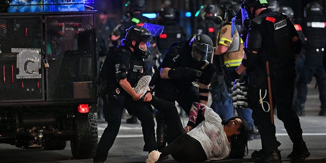CHARLOTTE, USA - MAY 31: Following the death of George Floyd in Minneapolis, protest in downtown Charlotte turn violent in NC, United States on May 31, 2020 (Photo by Peter Zay/Anadolu Agency via Getty Images)
