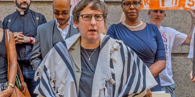 OMNI BERKSHIRE PLACE HOTEL, NEW YORK, UNITED STATES - 2016/09/13: Rabbi Sharon Kleinbaum, Congregation Beth Simchat Torah - Today GAG NY, NYAGV, NAN, Judson Church, CBST, MCC NY, NYC PA , and Public Advocate Tish James held a press conference in front of the Onmi Berkshire Place Hotel condemning the appearance of Smith &amp;amp; Wesson CEO James Debney at the 2016 Best Ideas Conference. Religious leaders, activists, elected officials, and gun reform leaders all spoke about the dangerous and deadly culture of gun violence we are living in as well as the direct and deadly relationship between private equity investment (Black Rock) in gun manufacturers (Smith &amp;amp; Wesson). THE GUN BUSINESS IS KILLING AMERICA. 