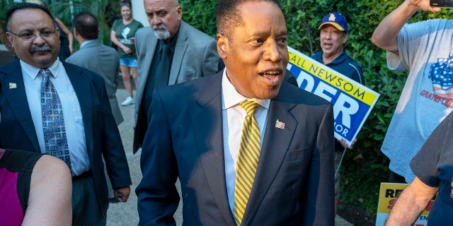 Woodland Hills, CA - August 24: California governor recall candidate Larry Elder meets supporters outside of the Warner Center Marriott Woodland Hills in Woodland Hills CA., Tuesday, August 24, 2021. (Photo by Hans Gutknecht/MediaNews Group/Los Angeles Daily News via Getty Images)