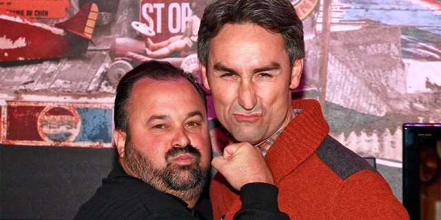 "American Pickers" Frank Fritz and Mike Wolfe attend the grand opening of the History Pop Shop in December 2010.