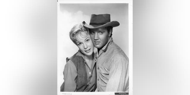 Barbara Eden and Elvis Presley in publicity portrait for the film 'Flaming Star', 1960. 