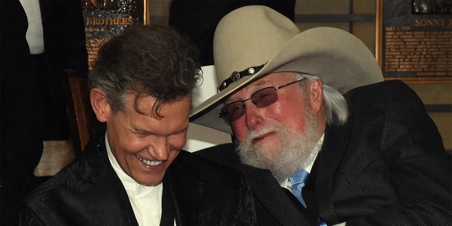   HOF members Randy Travis and Charlie Daniels attend the Country Music Hall of Fame And Museum medal ceremony to celebrate 2017 Hall of Fame inductees Alan Jackson, Jerry Reed and Don Schlitz at the Country Music Hall of Fame and Museum on October 22, 2017 in Nashville, Tennessee. 