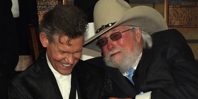 HOF members Randy Travis and Charlie Daniels attend the Country Music Hall Of Fame And Museum Hosts Medallion Ceremony To Celebrate 2017 Hall Of Fame Inductees Alan Jackson, Jerry Reed And Don Schlitz at Country Music Hall of Fame and Museum on October 22, 2017 in Nashville, Tennessee.