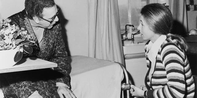 Princess Anne visiting journalist Brian McConnell at St George's Hospital in London after he was shot in the chest while attempting to intervene during the attempt to kidnap the Princess in the Mall, March 25, 1974. 