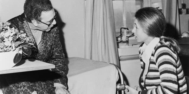 Princess Anne visiting journalist Brian McConnell at St George's Hospital in London after he was shot in the chest while attempting to intervene during the attempt to kidnap the Princess in the Mall, March 25, 1974.