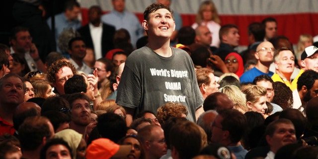 On Sept. 12, 2009: Igor Vovkovinskiy, 27, watched as President Barack Obama arrived to speak on health care during a rally at the Target Center in Minneapolis, Minnesota. 