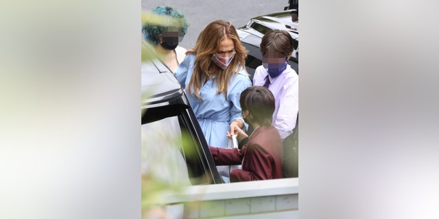 Ben Affleck and Jennifer Lopez spend their afternoon with all their well-dressed kids at The Magic Castle in Los Angeles.