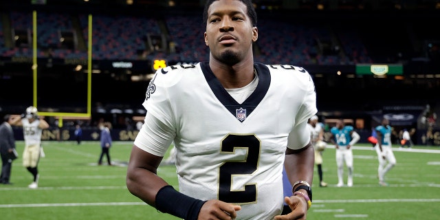 New Orleans Saints quarterback Jameis Winston (2) runs off the field after an NFL preseason football game against the Jacksonville Jaguars in New Orleans, Monday, Aug. 23, 2021. The Saints won 23-21.