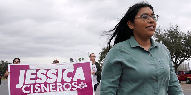 Democrat Jessica Cisneros, who is campaigning for a House seat, participates in the Citrus Parade to introduce herself to the attendees in Mission, Texas, Jan. 25, 2020. (REUTERS/Veronica Cardenas)