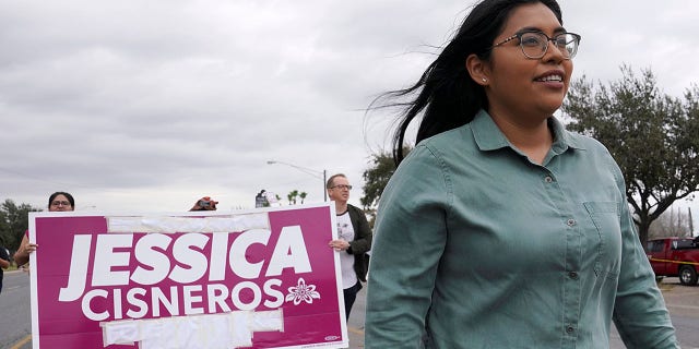 Democrat Jessica Cisneros, who is campaigning for a House seat, participates in the Citrus Parade to introduce herself to the attendees in Mission, Texas, Jan. 25, 2020. (REUTERS/Veronica Cardenas)