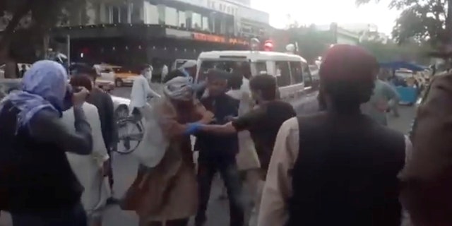 Injured people arrive at a hospital in Kabul, Afghanistan, Aug. 26, 2021. 