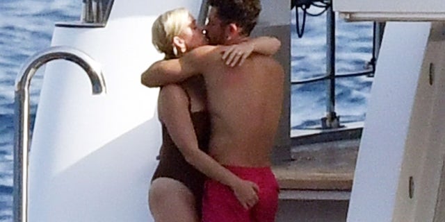 Katy Perry and Orlando Bloom couldn't keep their hands off each other during a luxury yacht day in Capri, Italy.