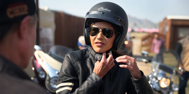 STURGIS, SOUTH DAKOTA - AUGUST 09: Governor Kristi Noem of South Dakota arrives at the Sturgis Buffalo Chip campground after riding in the Legends Ride for charity on a 2021 Indian Chief on August 09, 2021 near Sturgis, South Dakota. Each August hundreds of thousands of motorcycling enthusiast come to the southwest corner of South Dakota for the annual Sturgis Motorcycle Rally. This year the rally is expect to draw more than 500,00 people during its 10-day run. (Photo by Scott Olson/Getty Images)